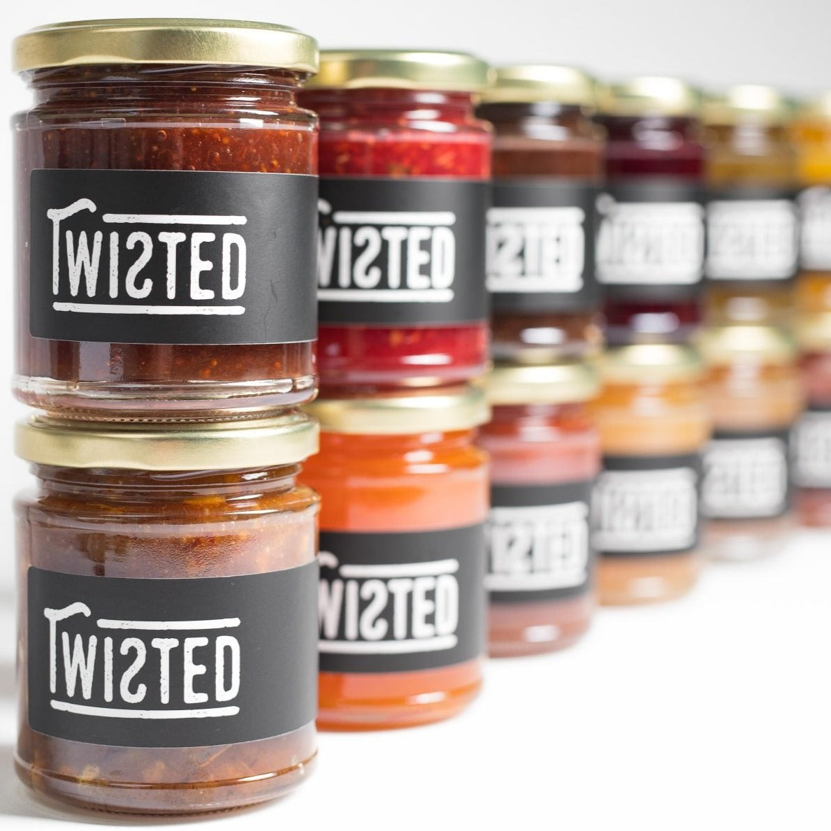 Gestapelde potjes jam van twisted